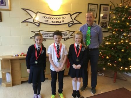 Well done to Emma Hagan (3rd), Adam Dolan (2nd) and Rosa McGinn (2nd) for finishing in the top half of the field in the Flahavan's Fun Run this December! Pictured with PE Co-ordinator Mr O'Neill.