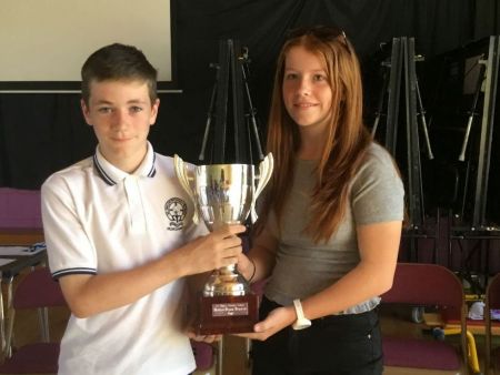 Taking over from Matthew Kerr (winner in 2017) is Ben Kelly receiving the Matthew Drumm Memorial Cup